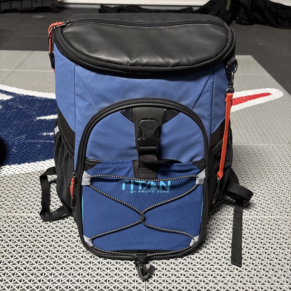 Titan Blue Cooler Backpack with Black Trim and Orange Accents